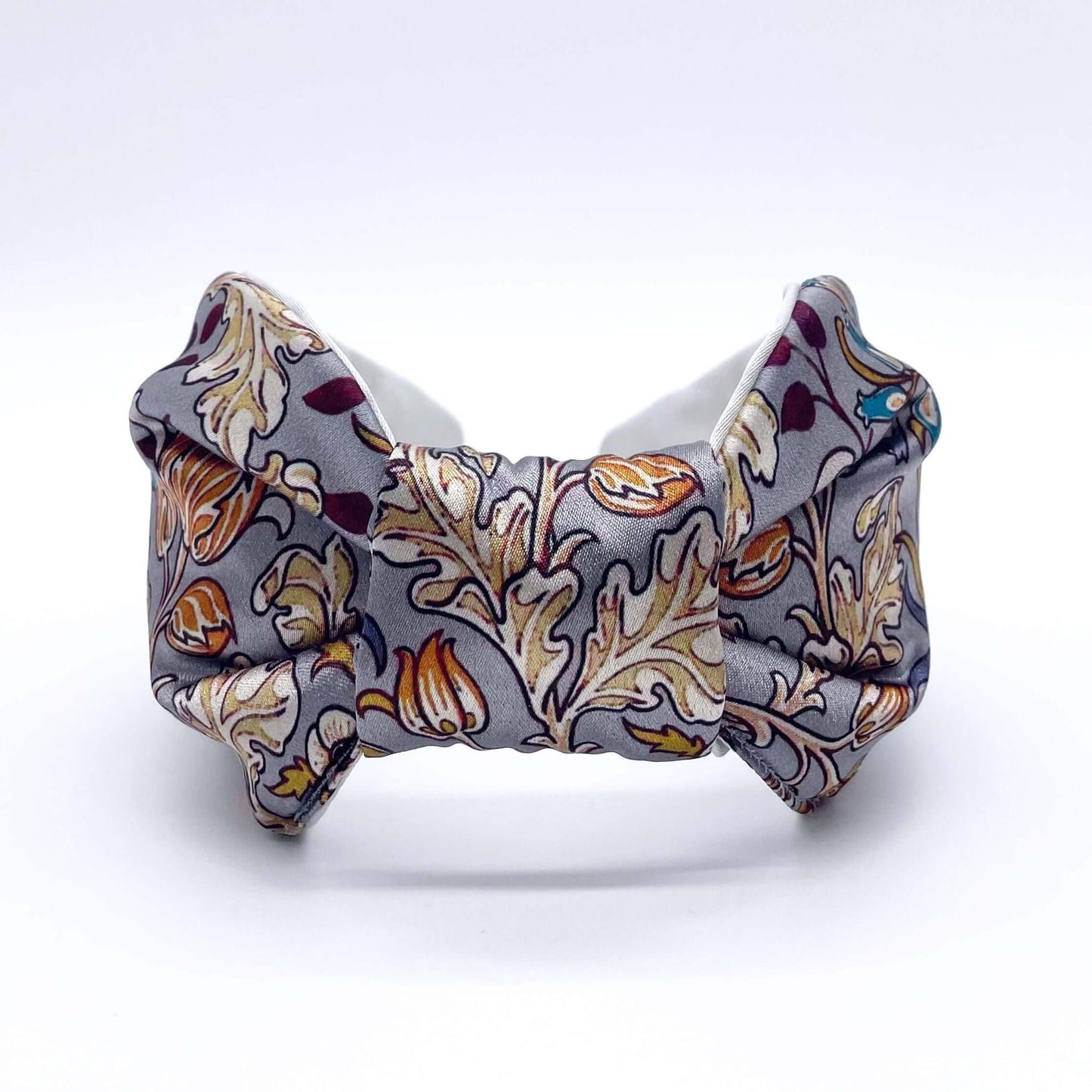A beautiful grey, William Morris-inspired, patterned knot headband.