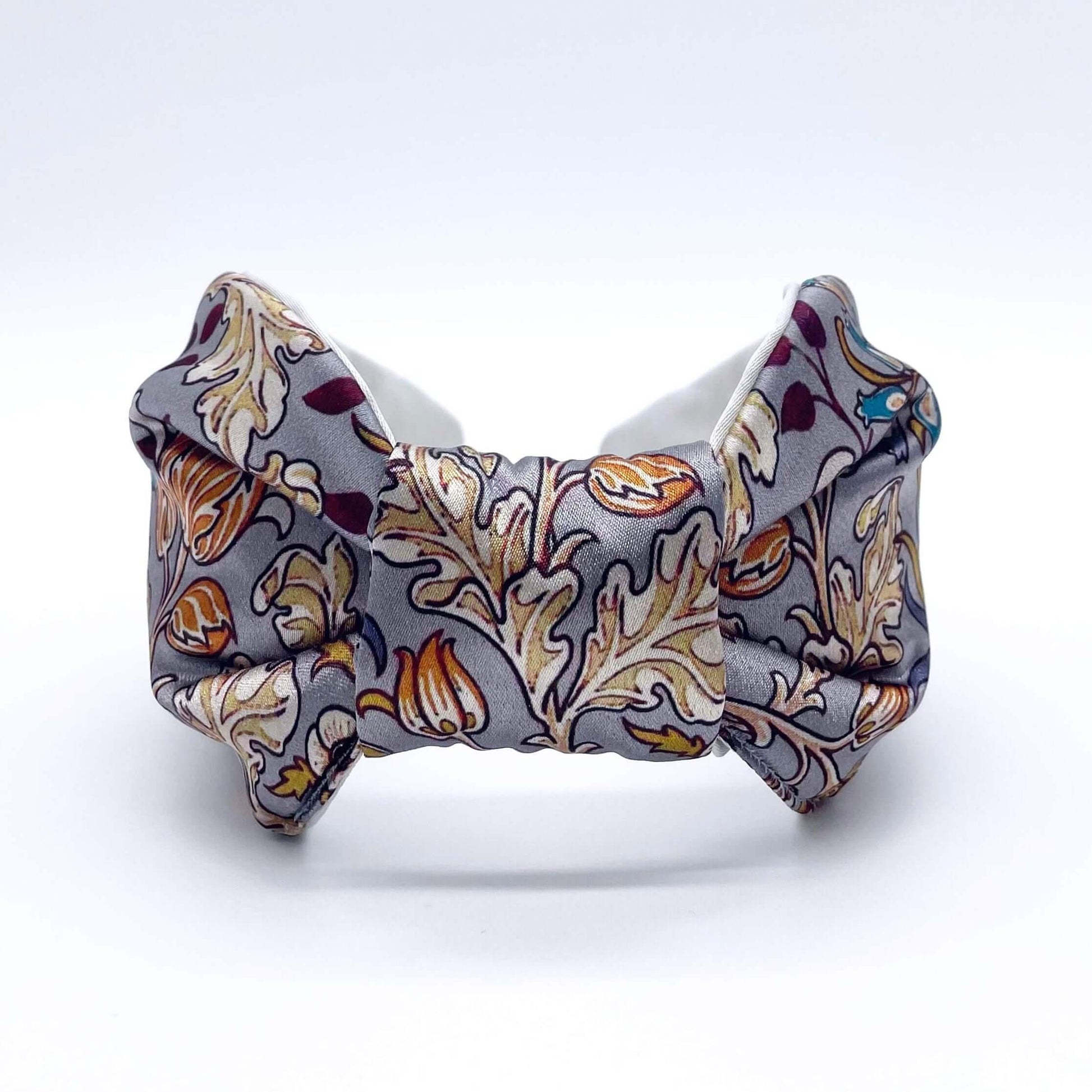 A beautiful grey, William Morris-inspired, patterned knot headband.