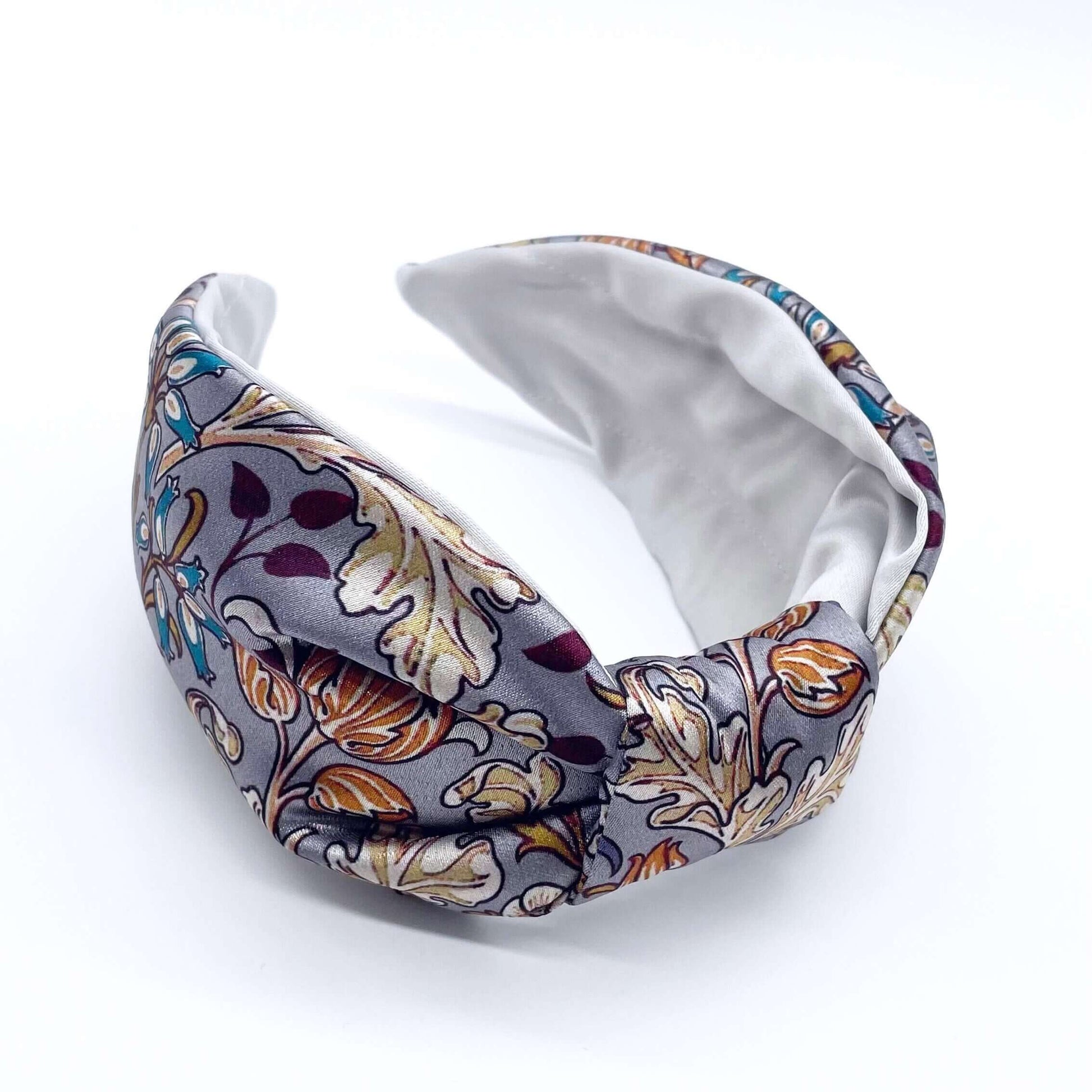 A beautiful grey, William Morris-inspired, patterned knot headband.