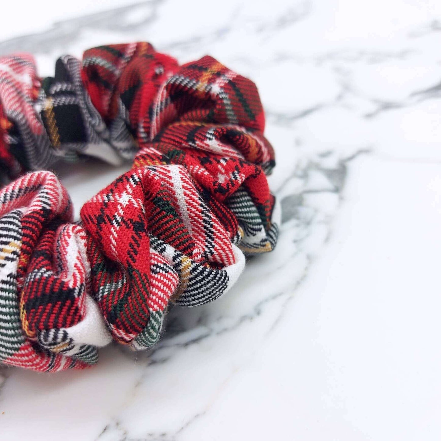 A luxury tartan check, red and white hair scrunchie.