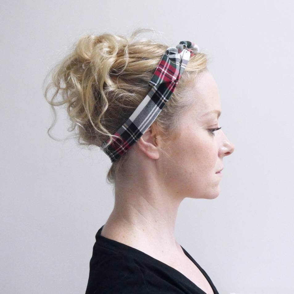 Model wears a soft, red and white tartan check fabric, tie headband, tied in a pretty knot.