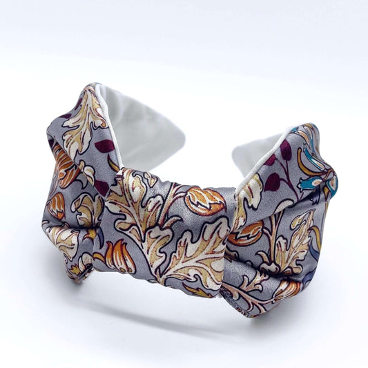 A beautiful grey, William Morris-inspired, patterned knot headband.