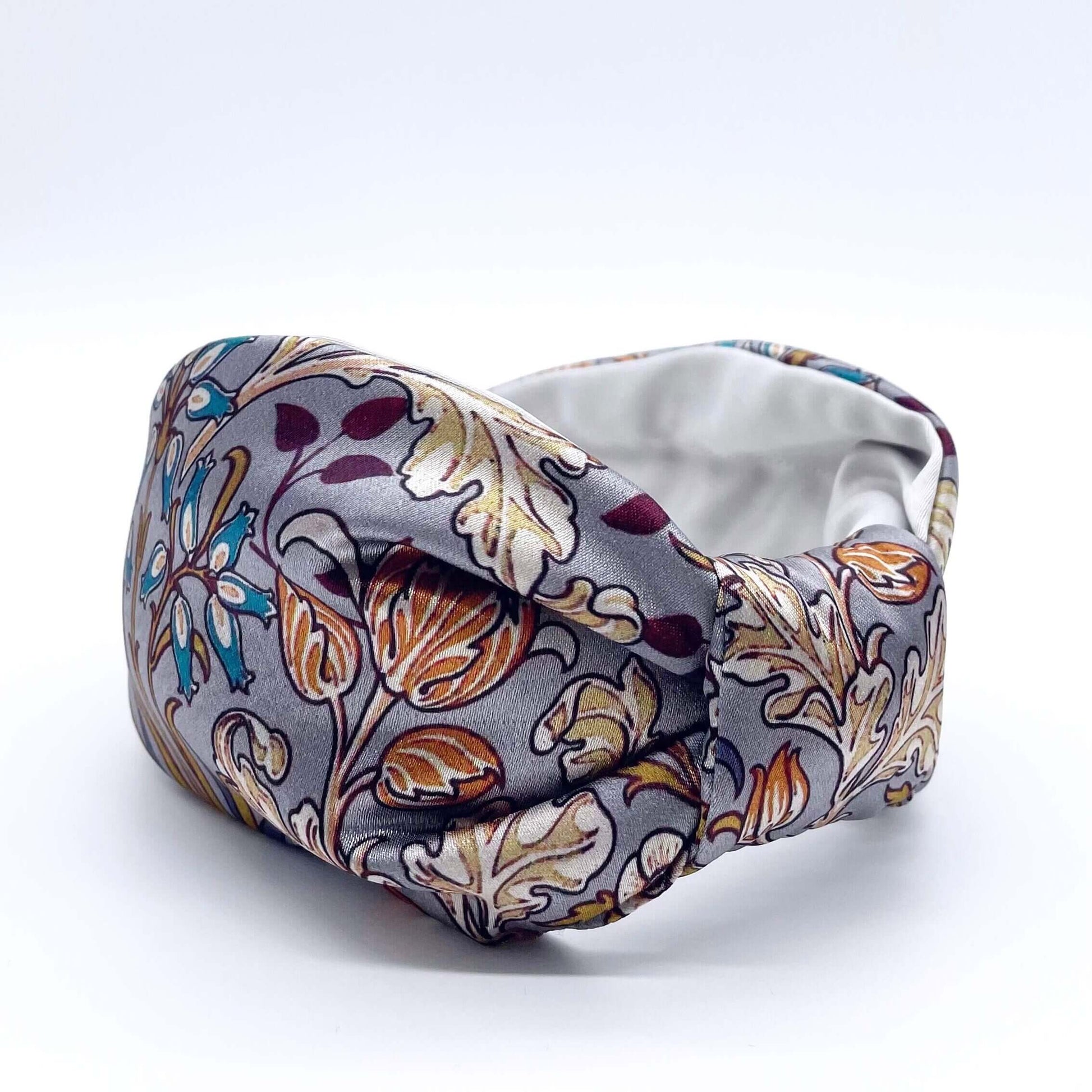 A beautiful grey, William Morris-inspired, patterned knot headband.