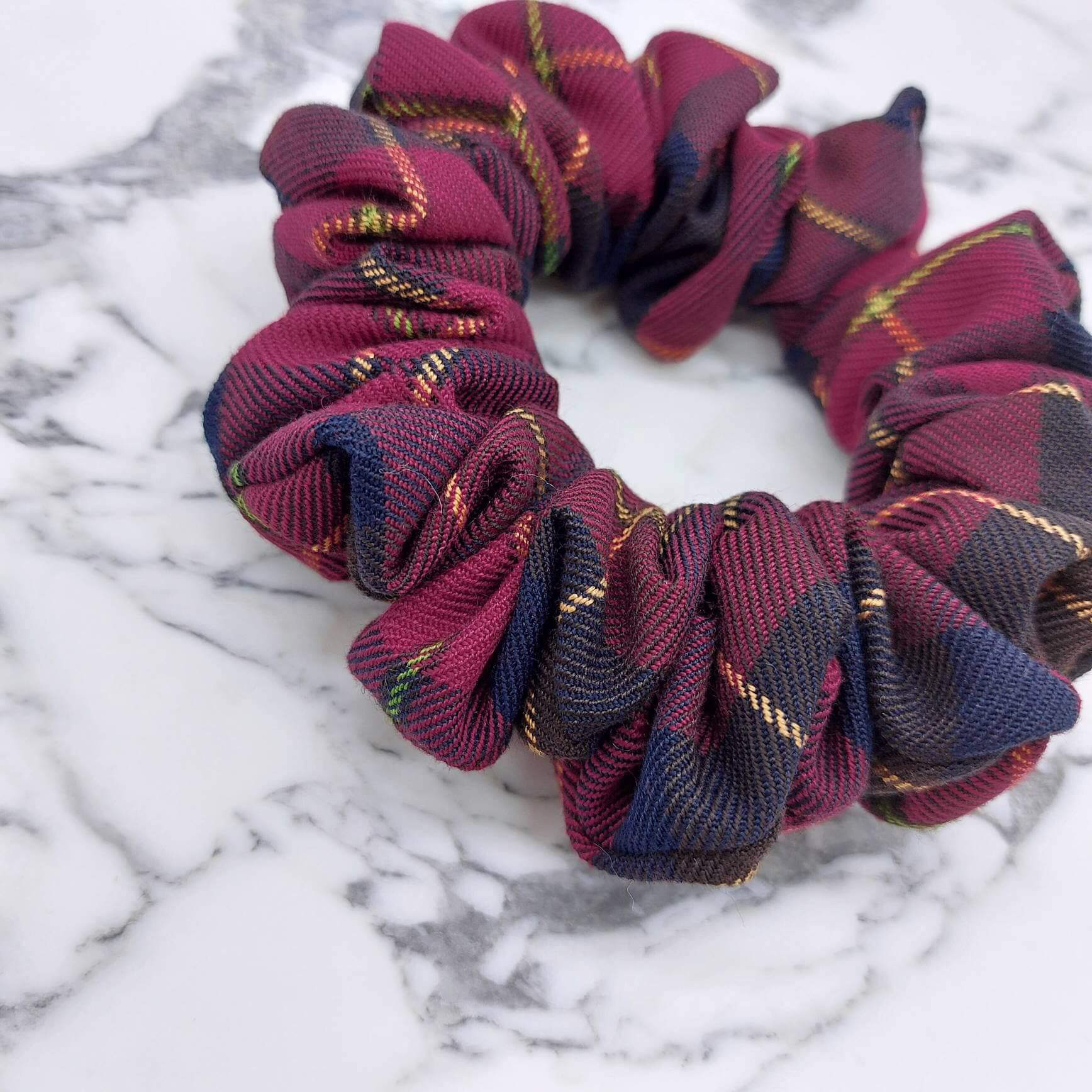 A luxury tartan check, cranberry red and brown hair scrunchie.