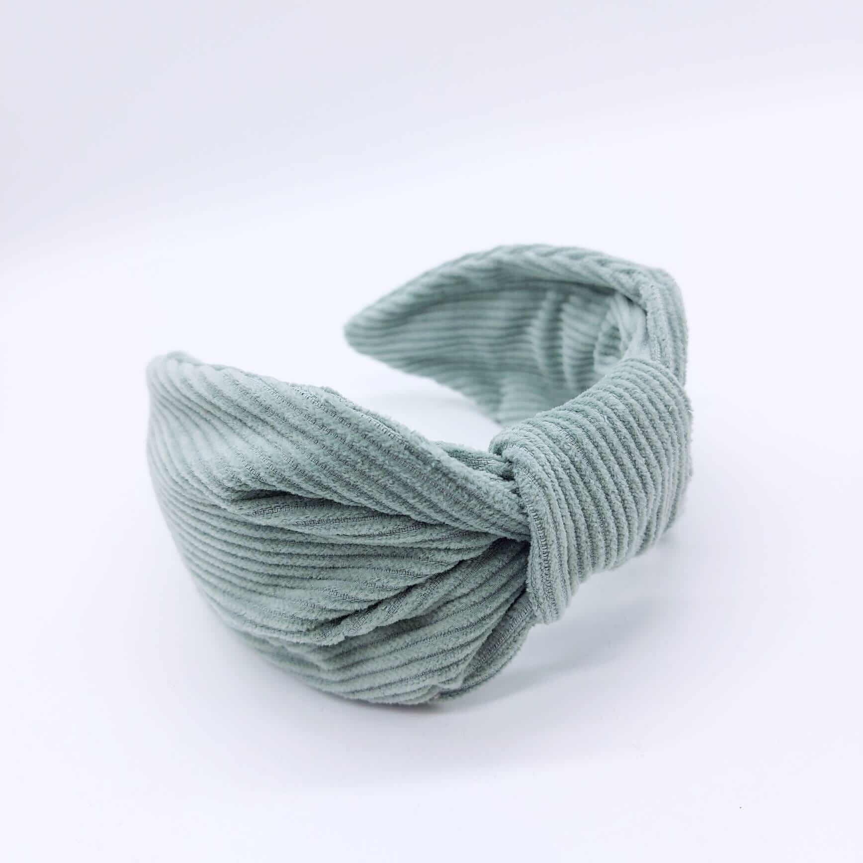 A luxury bow-style, pale blue-coloured thick corduroy fabric knot headband.